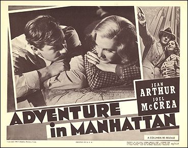 Adventure in Manhattan Jean Arthur Joel McCrea pictured looking at a model building on stage - Click Image to Close