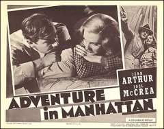 Adventure in Manhattan Jean Arthur Joel McCrea pictured looking at a model building on stage